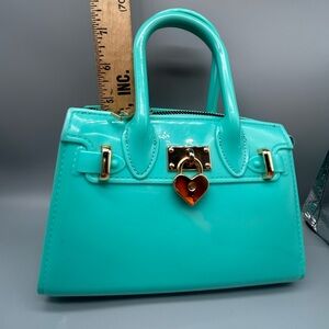Chic Turquoise Handbag with Gold Heart Accent